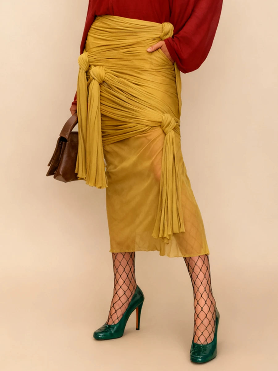 VGH Sexy Yellow Color Bodycon Midi Length Skirts for Women High Waist Spliced Bandage Folds See Through Skirt Female Autumn New