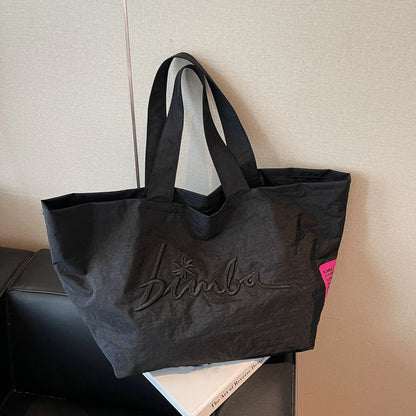 Fashionable and simple large capacity popular solid color handbag, personalized and multifunctional casual letter embroidered sh