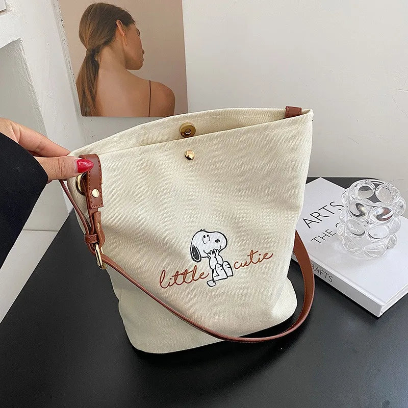2026 New Women's Snoopy Canvas Bucket Bag Embroidered "Little Cute" Cartoon Shoulder Bag Leather Strap Casual Daily Handbag