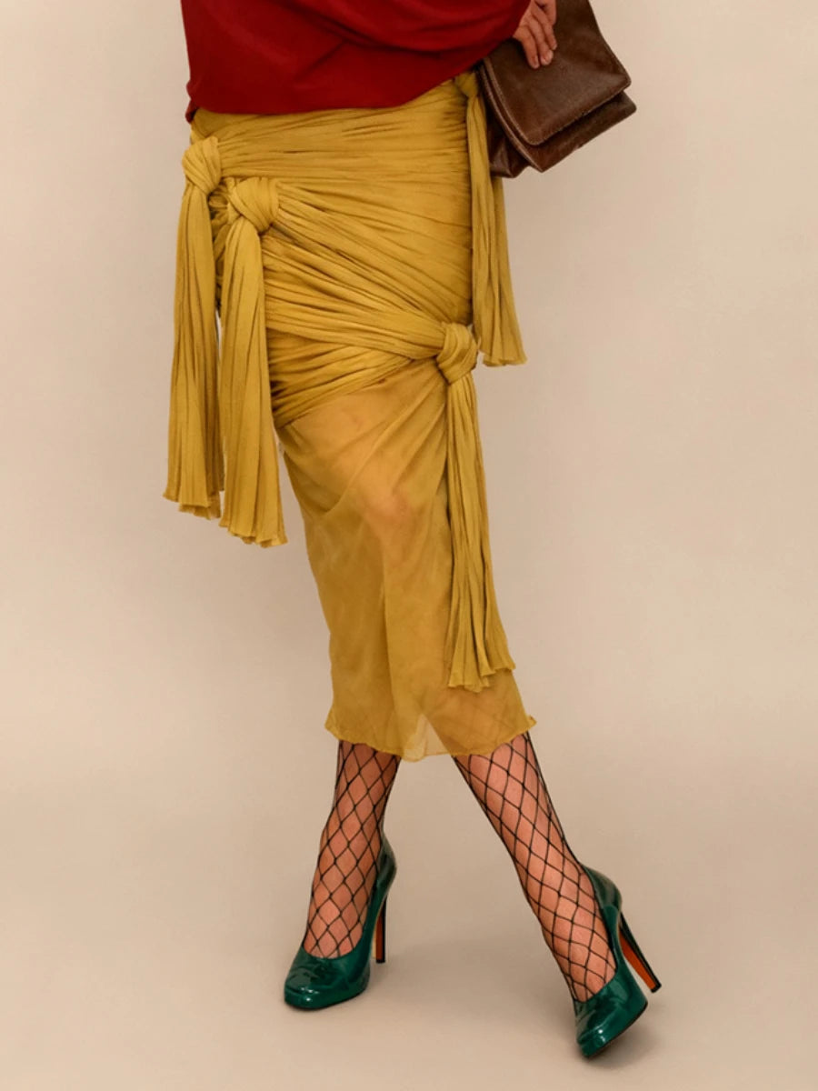 VGH Sexy Yellow Color Bodycon Midi Length Skirts for Women High Waist Spliced Bandage Folds See Through Skirt Female Autumn New