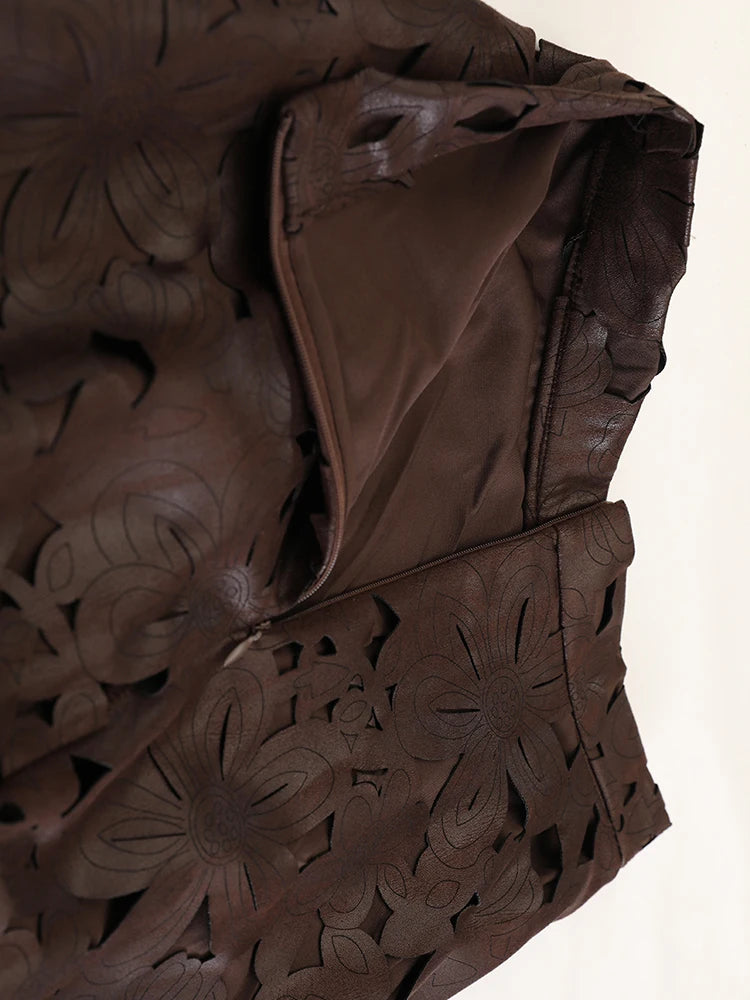 [EAM] High Waist Brown Pu Leather Hollow Out Elegant A-line Half-body Skirt Women Fashion Tide New Spring Autumn 2026 1DJ4309