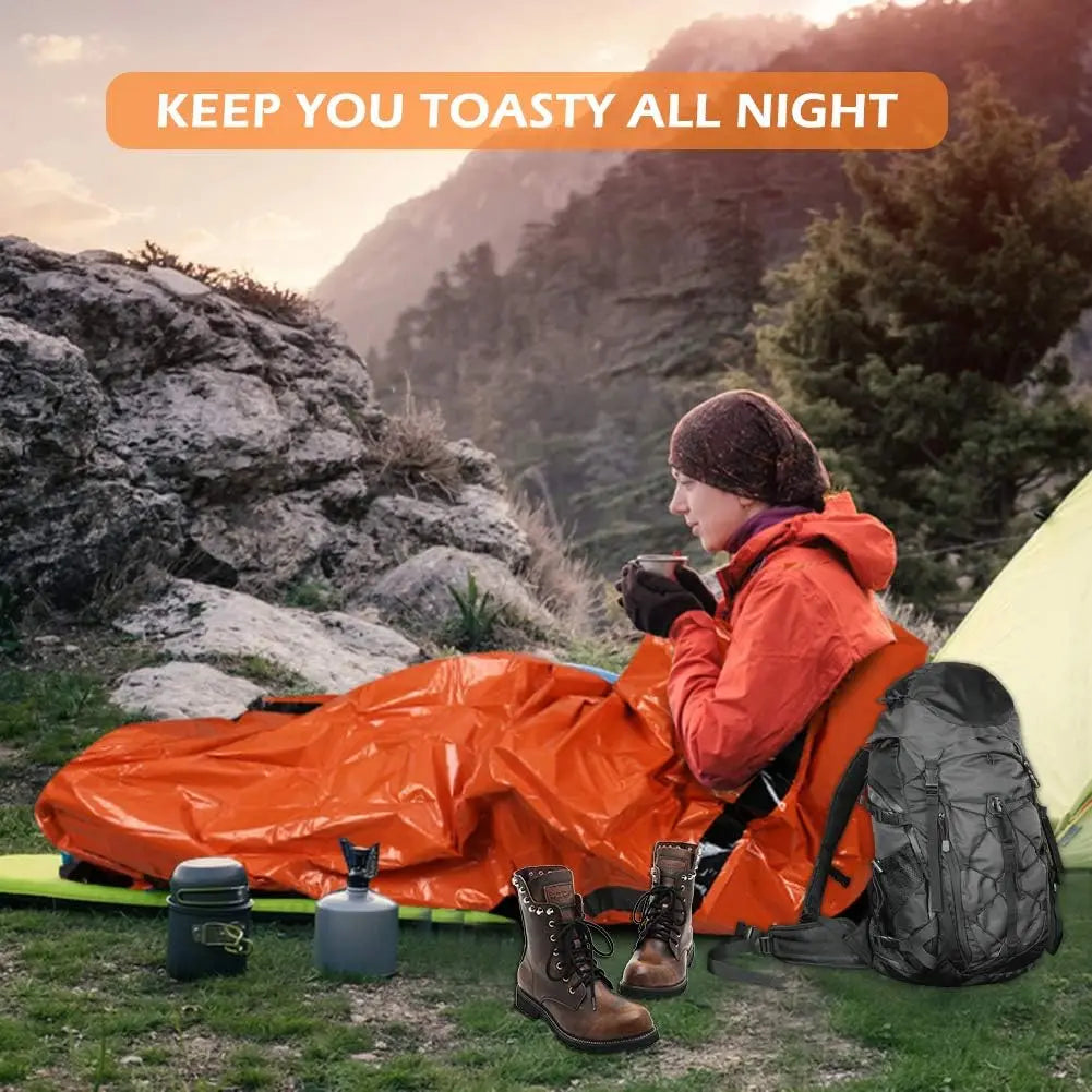 Insulated emergency sleeping bag, reusable & compact w/ whistle. PE material, drawstring. For outdoor & first aid.
