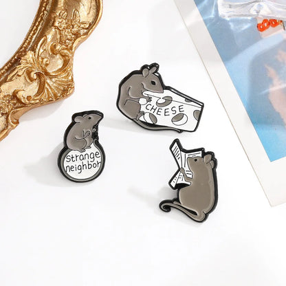 Smart and mischievous little mouse reading newspaper, climbing ladder to find food, cartoon cute animal brooch