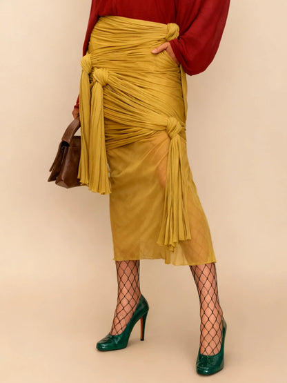 VGH Sexy Yellow Color Bodycon Midi Length Skirts for Women High Waist Spliced Bandage Folds See Through Skirt Female Autumn New