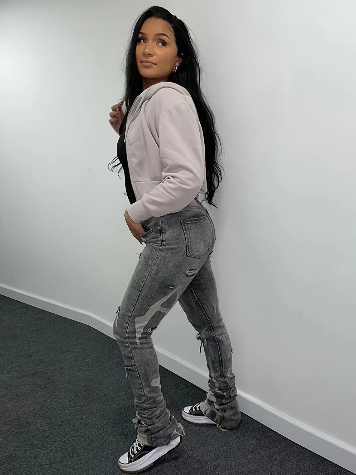 Popular female Spice Girl style slim-fit ripped jeans