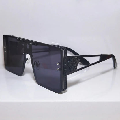 New stylish sunglasses with oversized frames, trendy metal design, perfect for fashion shows and cool street style.