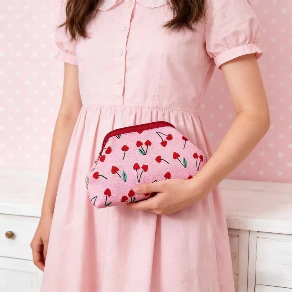 New women's cherry embroidery printed handbag, fashionable and convenient fly-knitted bag, versatile commuter cloud bag.