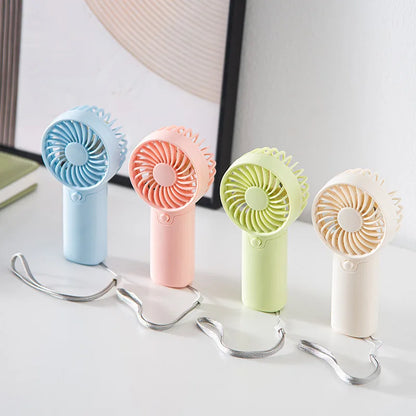 Portable Handheld Mini Fan for Summer Cooling Compact Desk Fan with Strong Airflow Simple Design Ideal for Outdoor travel Use