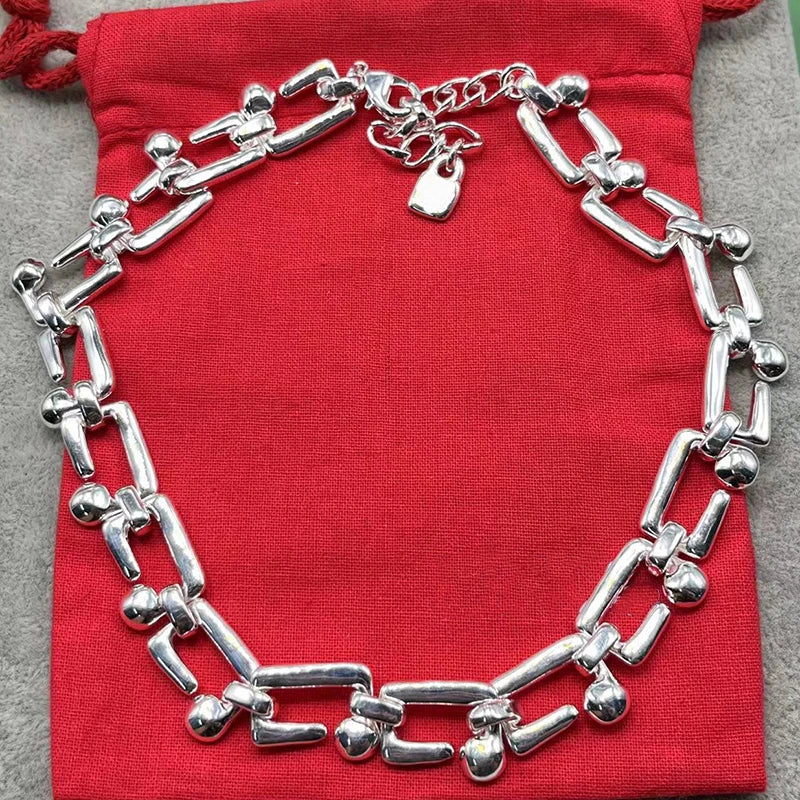 Jewelry Handmade Se . Necklaces and bracelets in gold/silver tones with crystal pendants and chain designs.